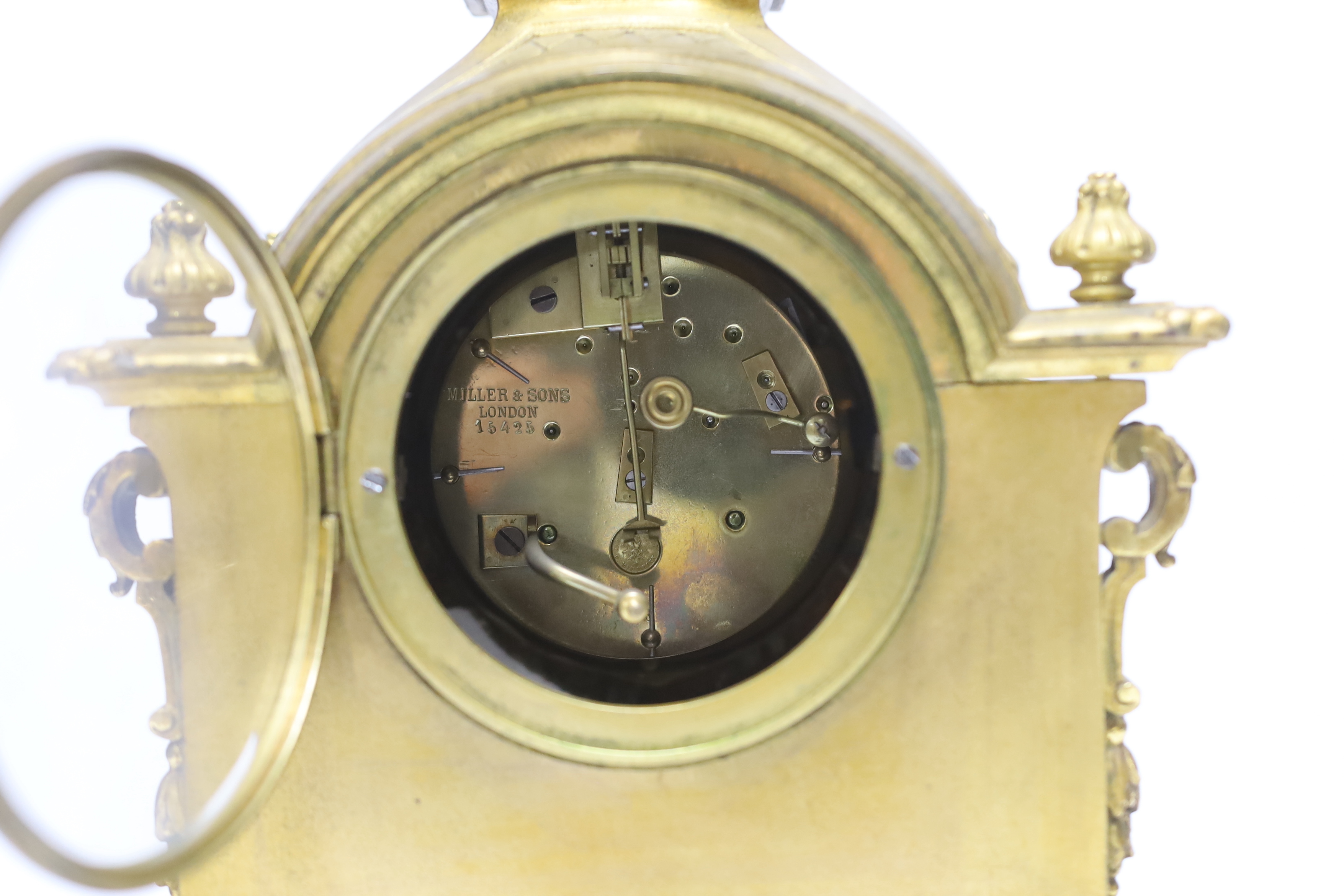 A Sevres style ormolu clock, Miller & Sons with two similar gilt spelter urns, pendulum no key, 44cm